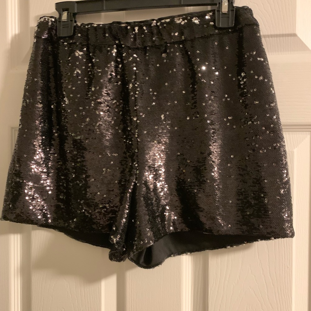 Like New Fabulous Sequin Short, black with some silver sequin . Size is Medium